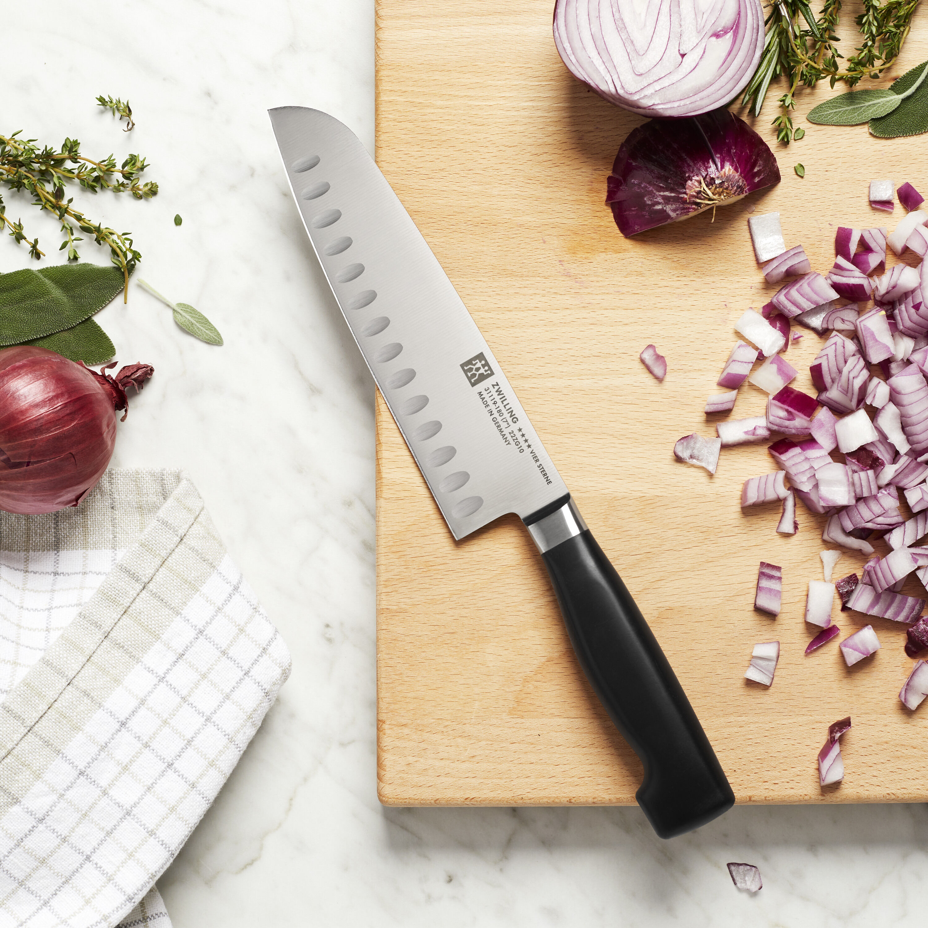 Zwilling J.A. Henckels Four Star Santoku Knife