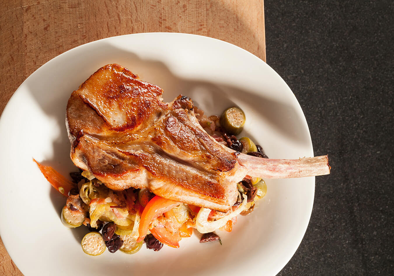 Pork chops with bacon-caper sauce