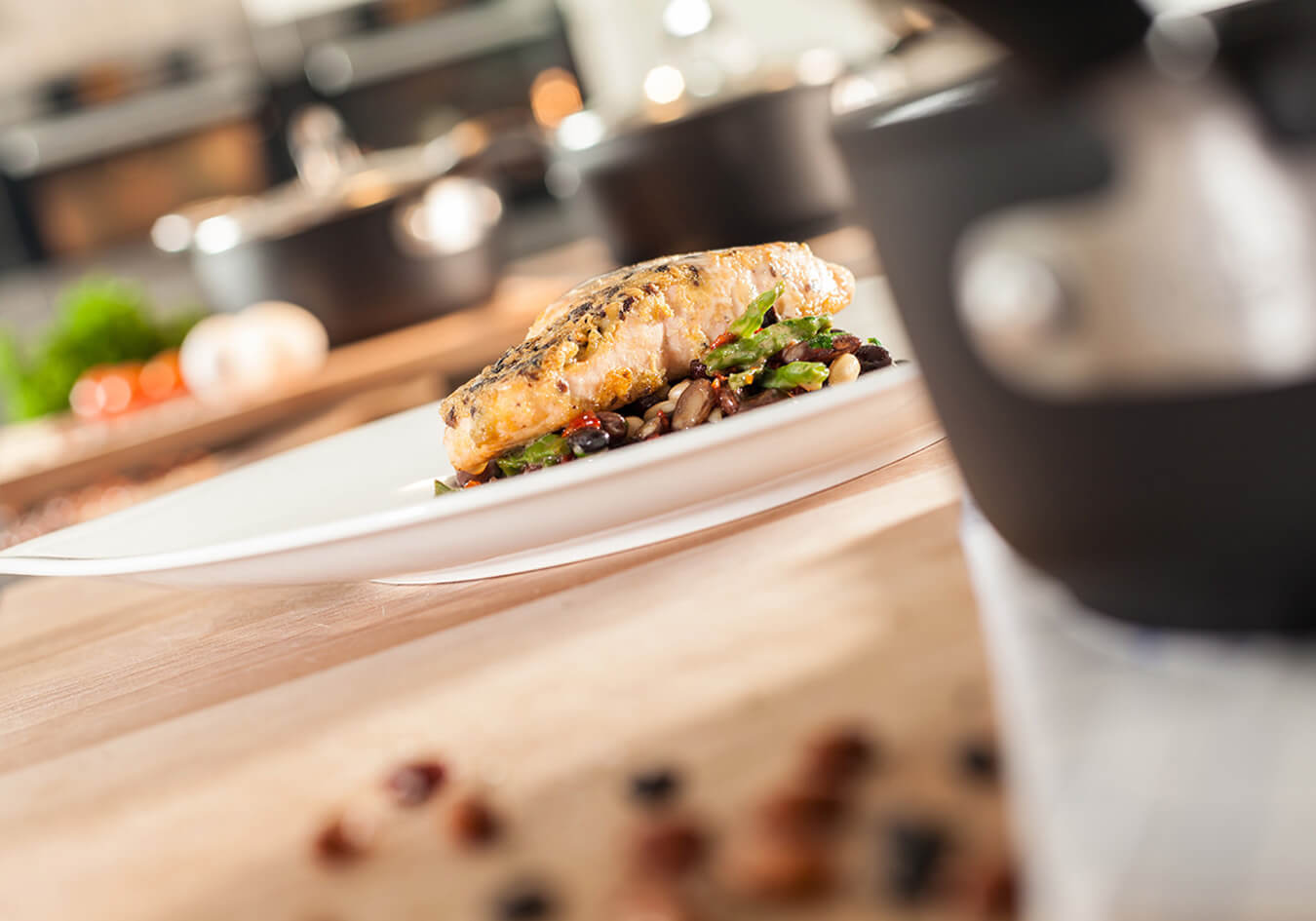 Salmon in an olive crust with beans