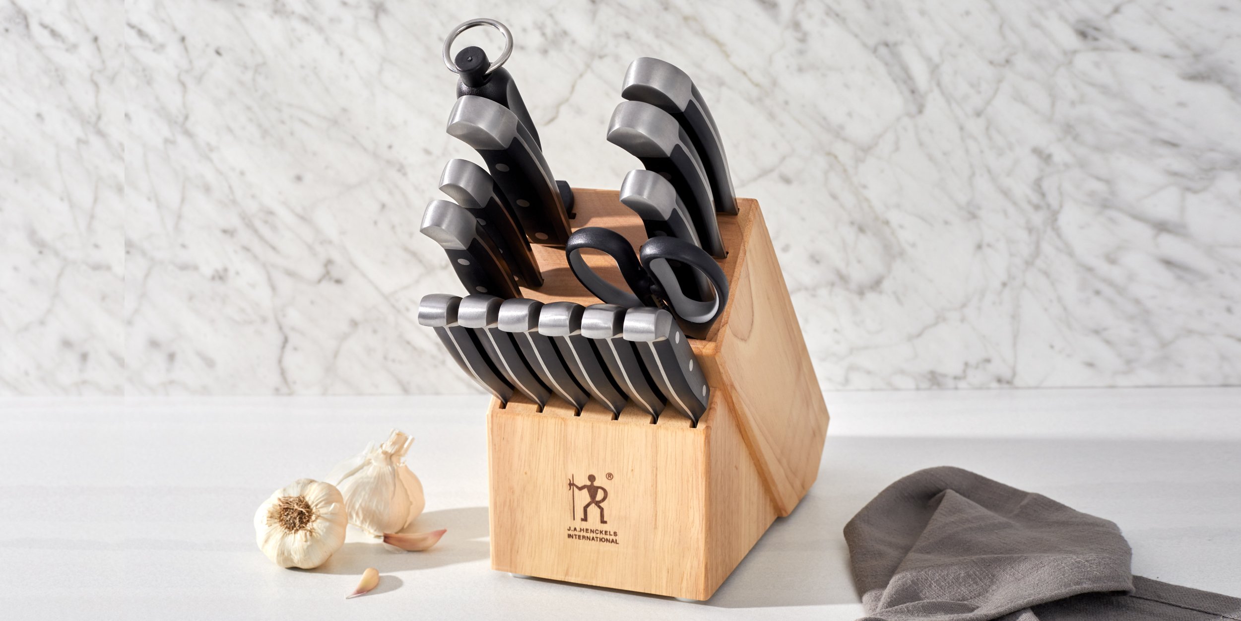 https://www.zwilling.com/on/demandware.static/-/Sites-zwilling-us-Library/default/dw0f08b66f/images/product-content/masonry-content/henckels/cutlery/Statement_Mason_Comp_HE_Statement_Masonry_1200x600_Main.jpg