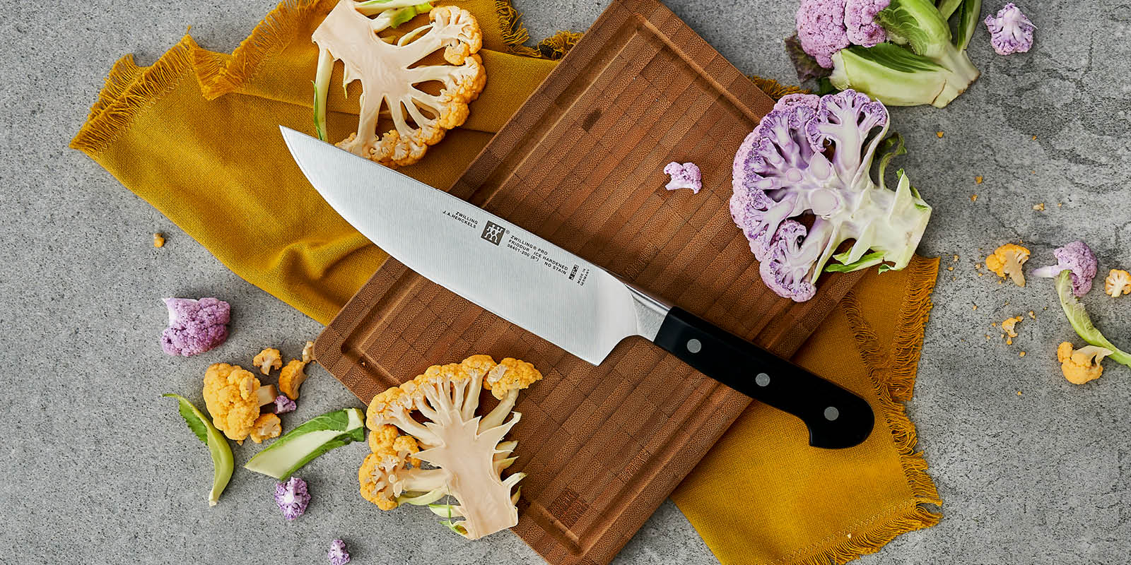https://www.zwilling.com/on/demandware.static/-/Sites-zwilling-us-Library/default/dw2105face/images/product-content/masonry-content/zwilling/cutlery/pro/38401-201-0_Lifestyle_Image_Series_OS_1200x600.jpg