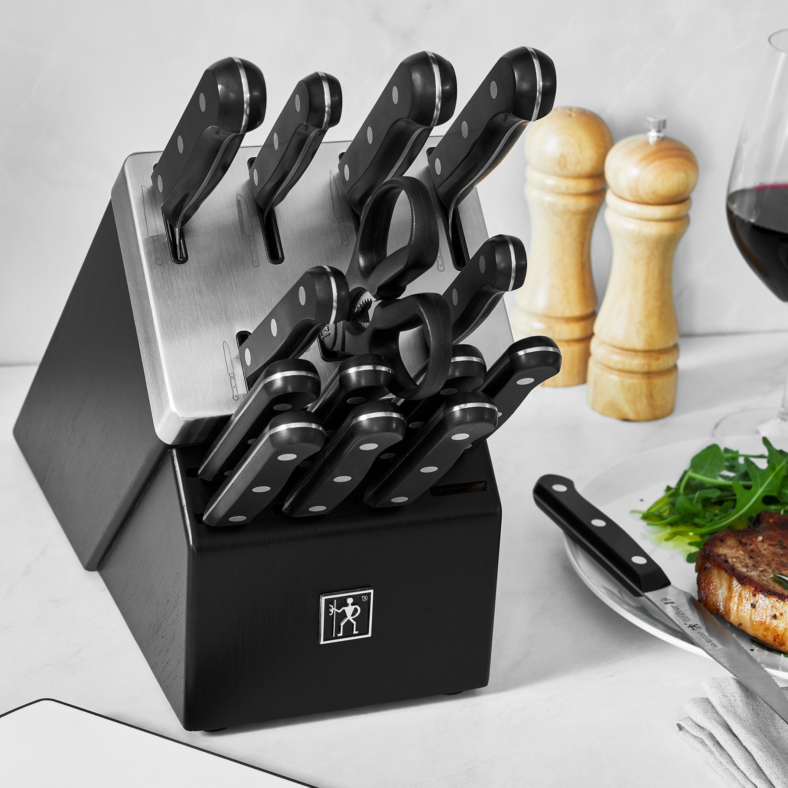 https://www.zwilling.com/on/demandware.static/-/Sites-zwilling-us-Library/default/dwfbe5a531/images/product-content/masonry-content/henckels/cutlery/Solution_02.jpg